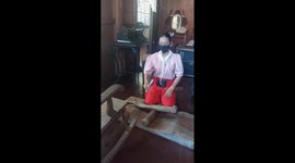 Tour guide shows how Filipinos press clothes in Spanish era