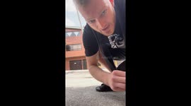 Person kicks street post in Medellin saying 'pain is temporary'