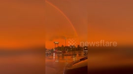 Orange rainbow captivates onlookers in Minnesota