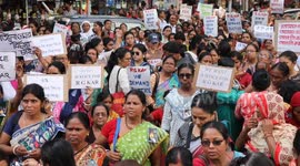 Women participate in ''Journey of Commitment'' during a protest march against the rape and murder of a PGT woman doctor at Government-run R G Kar Medical College & Hospital, in Kolkata, India,