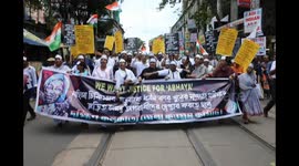 Citizens Are Participating In A Protest March In Kolkata, India