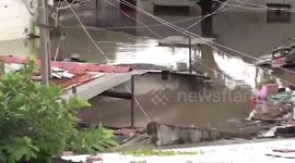 Crocodile chills on roof during floods in India