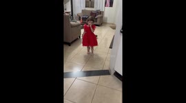 Toddler walks perfectly in mother's heels in Tangará da Serra, Brazil