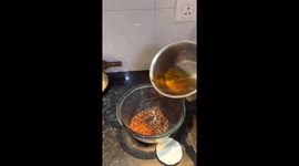 Hot oil mishap: glass bowl shatters while cooking