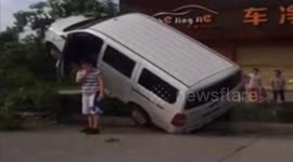 Minibus drives on tree