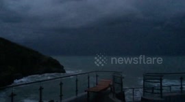 Stormy british weather in cornwall - stunning thunder and lightning over bay!