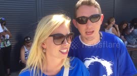 Happy couple interviewed at Bernie Sanders rally