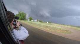 Storm chasers track large hail storm and tornadoes in Kansas