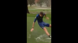 Skimboarding on a golf course during Sydney storm