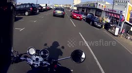 Driver reverses car into bollard
