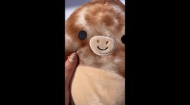 Artist shows process of making a squishmallow replica on a nail