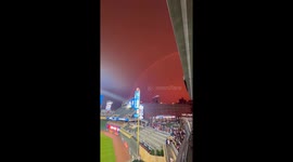 Red Sky with Double Rainbow over Baseball Stadium