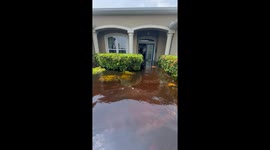 Heavy rain from Hurricane Debby submerges the streets in Sarasota, Florida