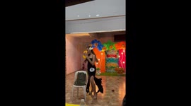Employee throws gifts at crowd during talent show to earn cheers