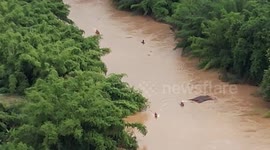 House washed away by river amid heavy rain in northern Thailand