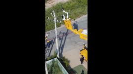 Robot repairs high-voltage lines in N China