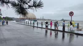 Tourist knocked off her feet by sudden tidal wave