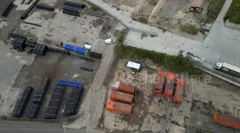 Light aircraft crash lands in industrial estate