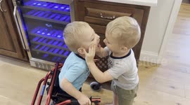 Watch 3-year-old identical twins Bryce and Levi play together and laugh hysterically! Despite Bryce being in his walker due to cerebral palsy, their joy and playful interactions are heartwarming and infectious.