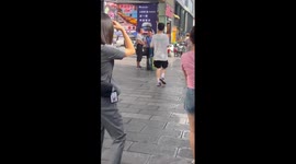 Street vendor cries upon seeing Communist rule enforcers in China