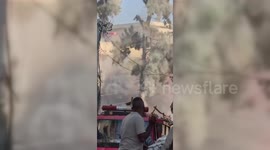Israeli missile hits school in northern Gaza where dozens were sheltering