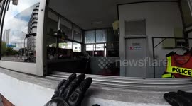 Passing motorists spot policeman's motorcycle on fire as officer sleeps on job