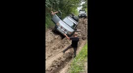 Land Rover successfully freed from muddy road in Georgia
