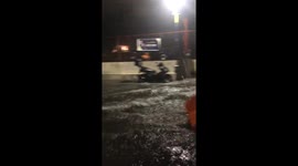 Streets flooded in Parañaque as residents rescue motorcycles and barriers