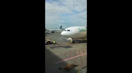 Moment Pakistani airline pilot reaches out to clean windscreen before takeoff