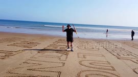 Giant image of the Tyne Bridge carved on beach near Newcastle