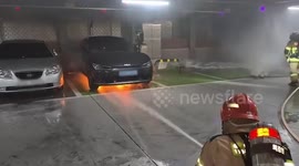 Firemen extinguish fire from electric vehicle in Korea