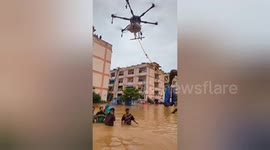 Indian government use drones to deliver aid to residents affected by severe flooding