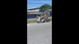 Police help disabled lottery seller pull her wheelchair