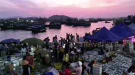 Morning bustle returns to port in China's Guangdong after fishing ban lifted
