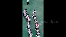 Shocking moment student at Chinese school faints and left unattended for almost 1 minute