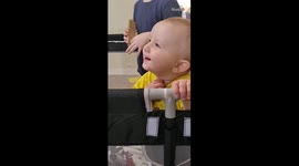 Little boy's playtime turns into laughter fest as he watches favorite TV show
