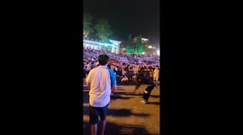 The little girl and boy performed a traditional hoop dance on the street, surprising many tourists