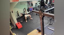 Young woman saves man's life by lifting heavy barbells that were crushing him