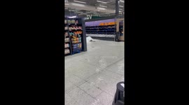 Rainwater Floods Into Grocery Store Through Drainpipe