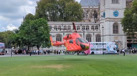 The London Air Ambulance leaves Parliament Square following a collision near the junction with Bridge Street
