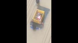 Baby floats through floods to safety in a plastic box