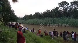 Grandfather ripped in half by crocodile while bathing in river in Indonesia