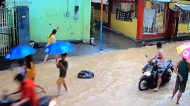 Timelapse footage shows typhoon flood engulfing homes in the Philippines