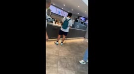 Punches thrown in violent brawl between staff at coffee shop in China