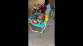 Baby falls asleep after extreme bounce session in Arizona