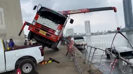 Bungling crane operator drops car in river during retrieval operation