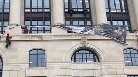 Greenpeace unfurl massive plastic pollution banner on Unilever HQ building in London