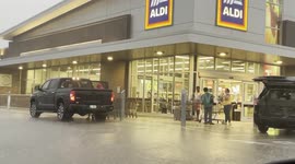 Shoppers Out in the Rain in Jacksonville