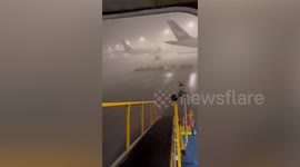 Typhoon Yagi batters planes at Hong Kong airport