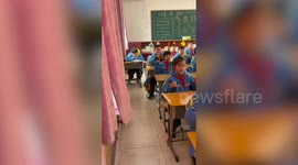 Cheeky schoolboy draws 'eyes' onto eyelids - so he can sleep in class